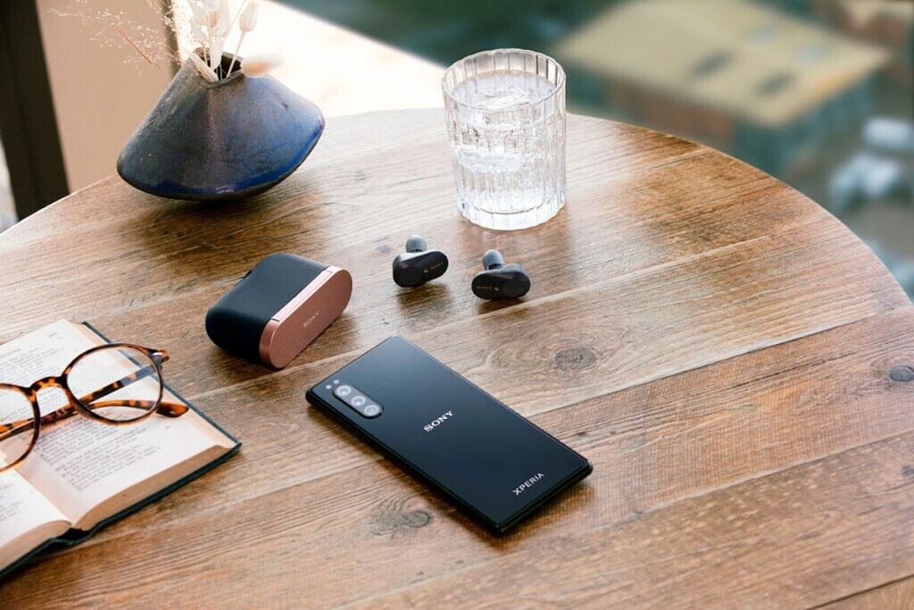 sony WF-1000XM3 earbuds on table with xperia phone