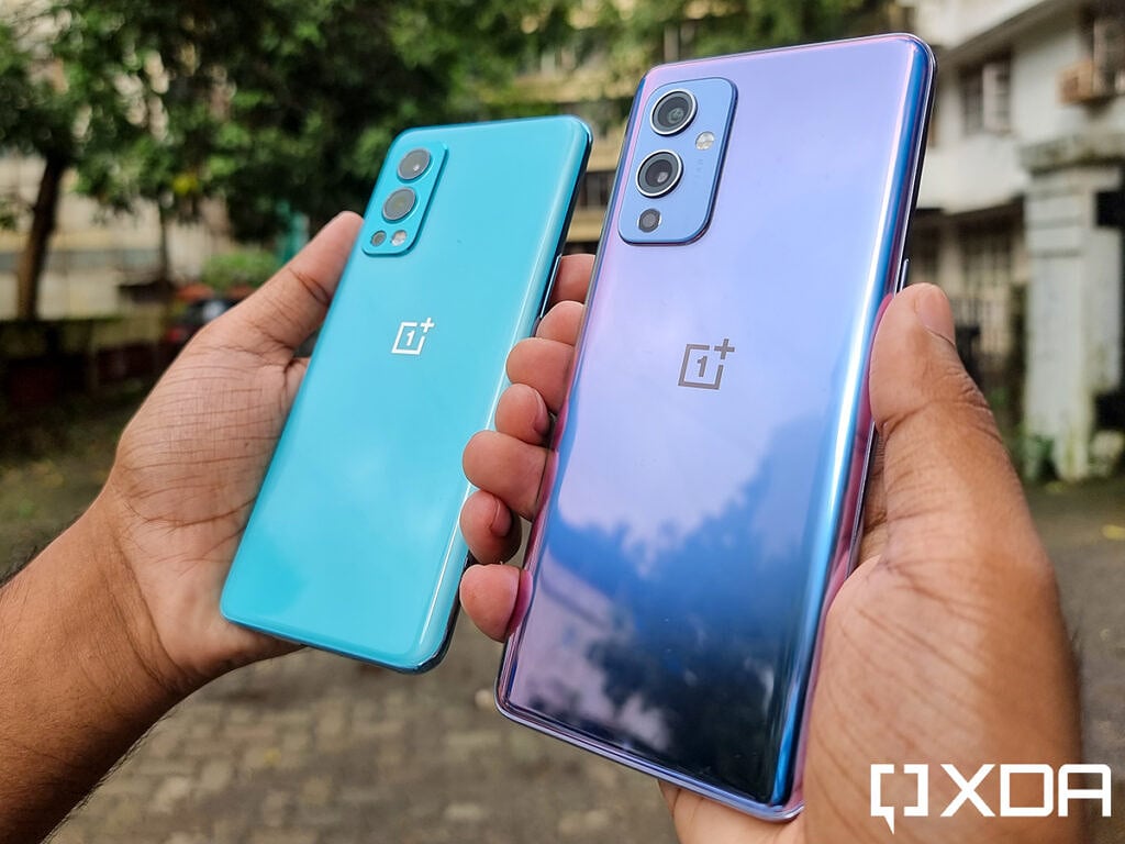 OnePlus Nord 2 and OnePlus 9 held out in hand