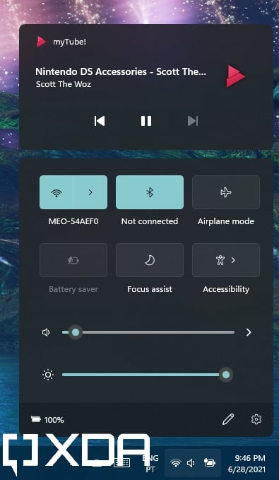 Quick Settings panel and playback controls in Windows 11