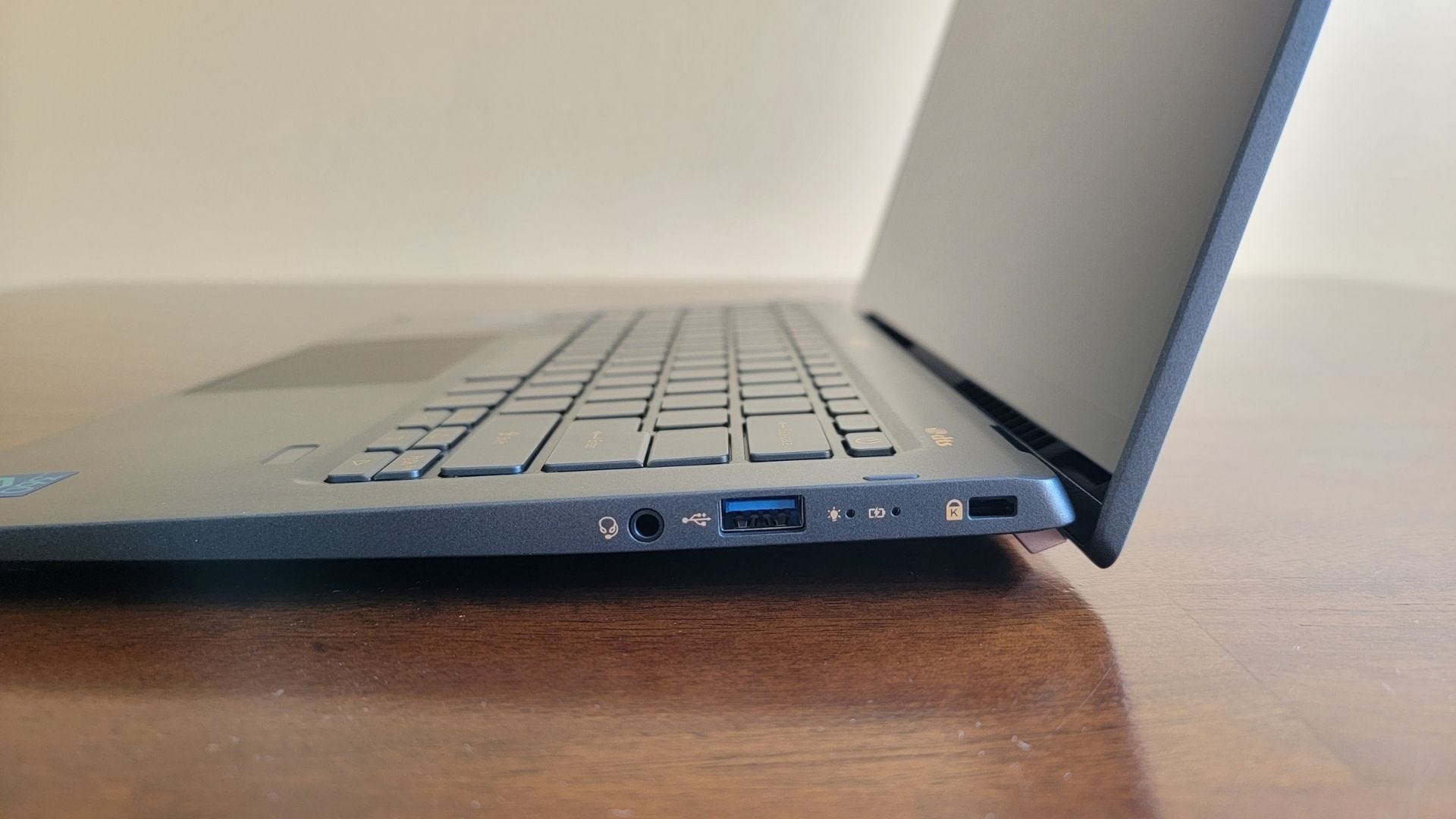 closeup of the right side of the acer swift 5 laptop, showing audio jack and usb port