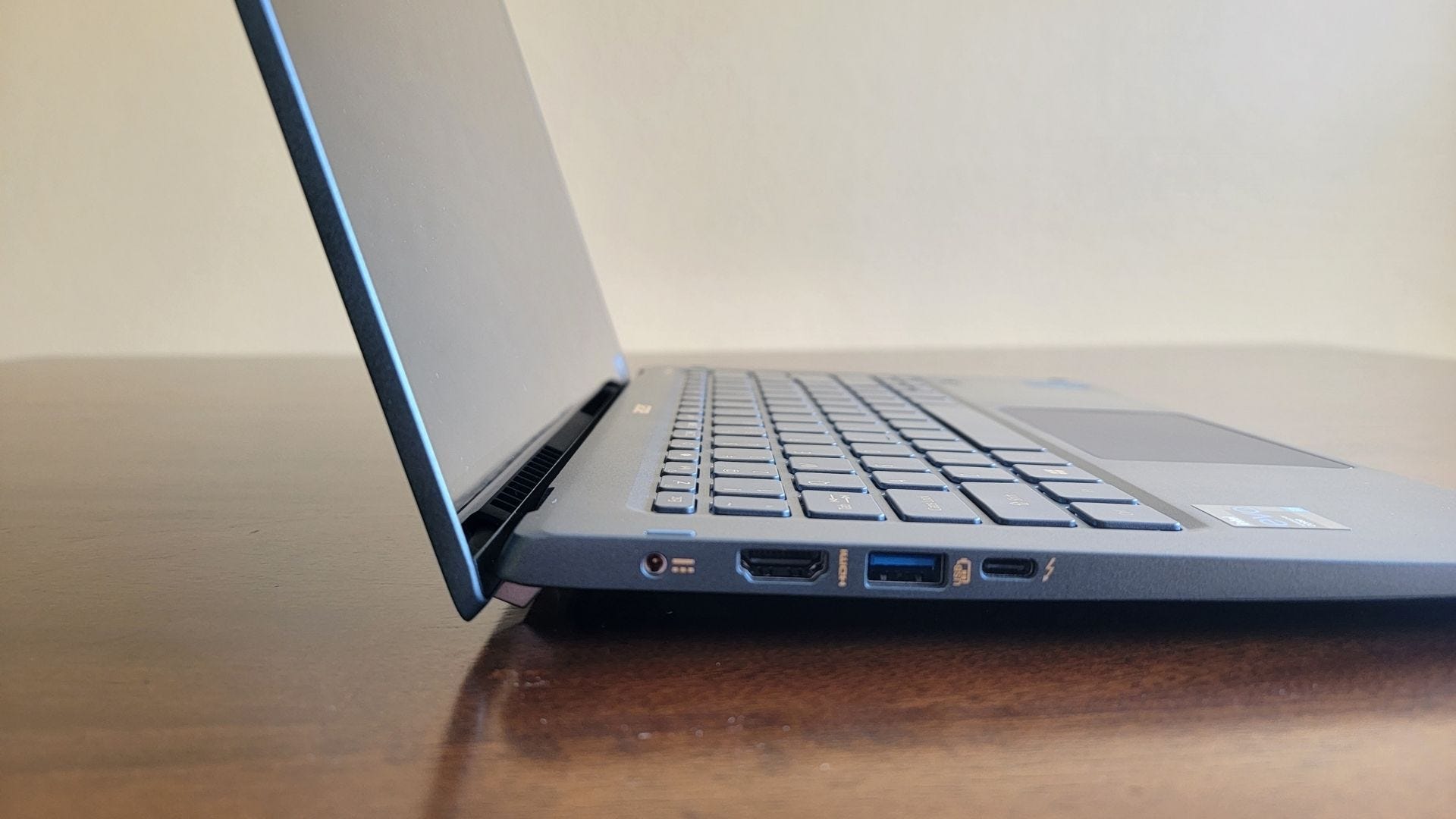 closeup of the left side of the acer swift 5 laptop, showing power slot, hdmi port, usb-a port, and usb-c port