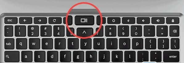 Tap the Overview key on the keyboard.