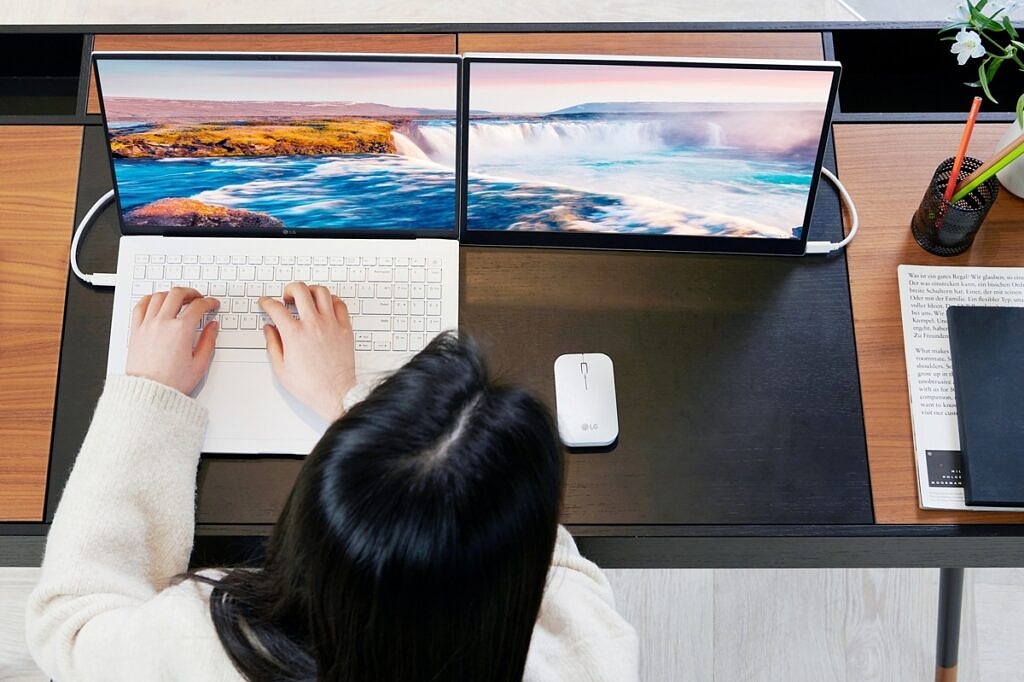 LG gram laptop next to a portable external monitor of the same size
