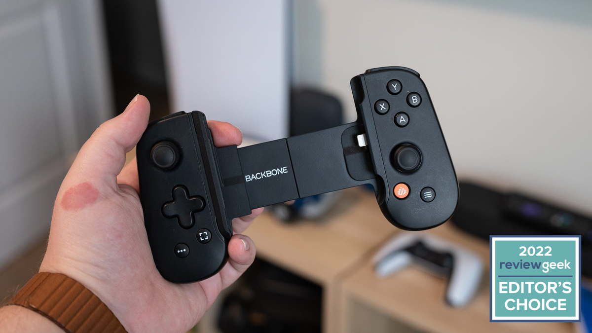 Person holding the Backbone controller in their hand