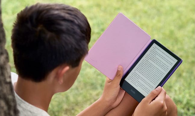 Child reading Kindle Paperwhite Kids