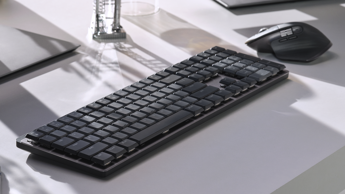 The Logitech MX Mechanical Mini keyboard and MX Master 3S mouse at a desk.