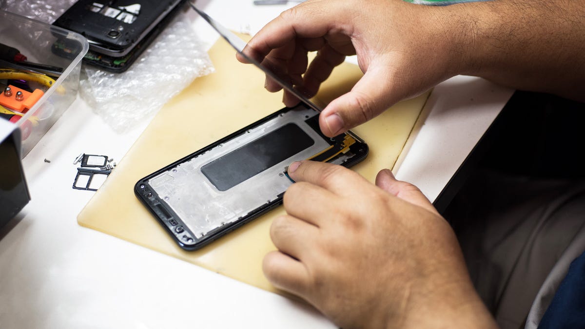 A phone being taken apart.