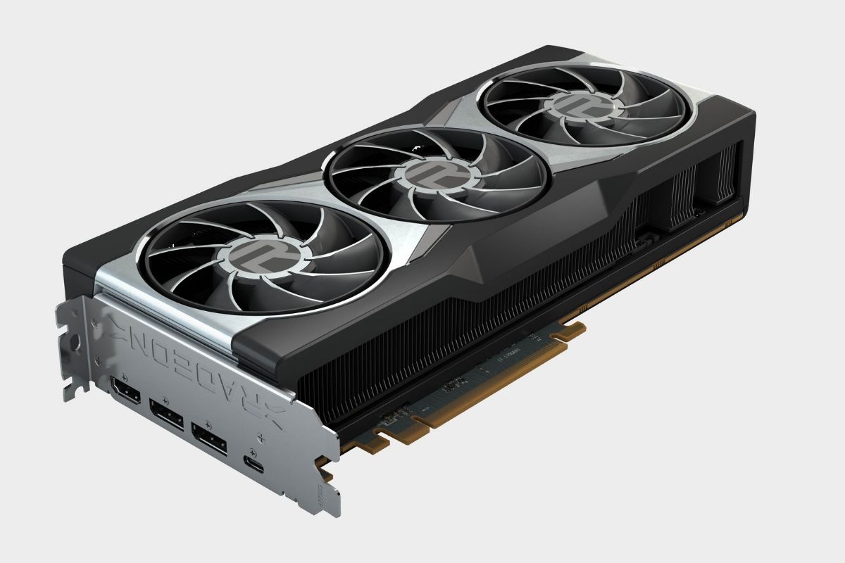 An AMD Radeon RX 6900 XT graphics card with three fans on a grey background