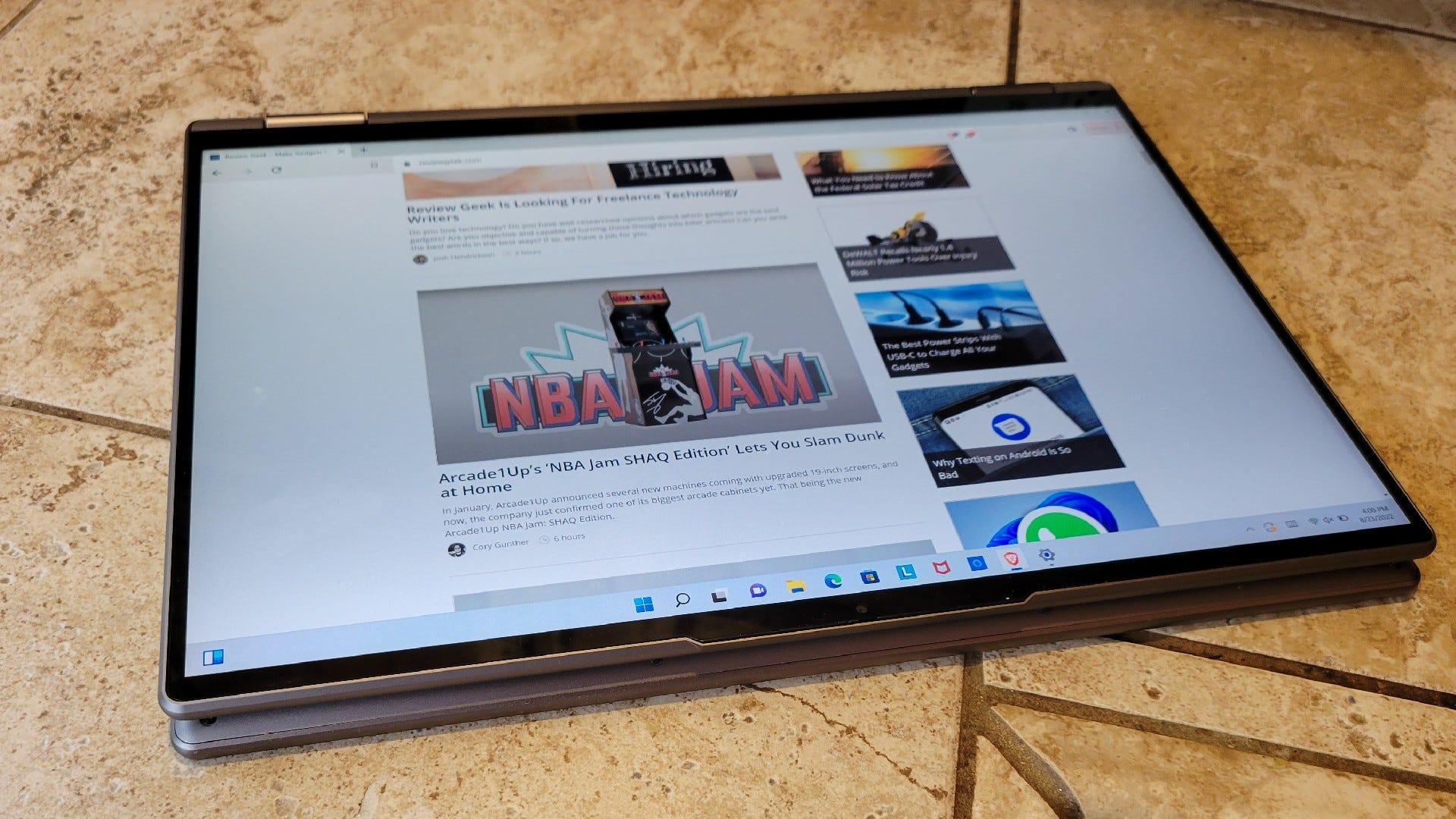A yoga 7 laid down in tablet mode