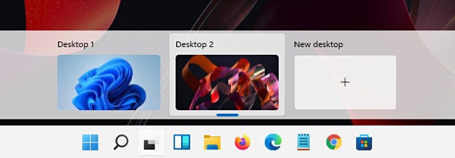 Different desktop wallpaper on different virtual desktops in Windows 11.