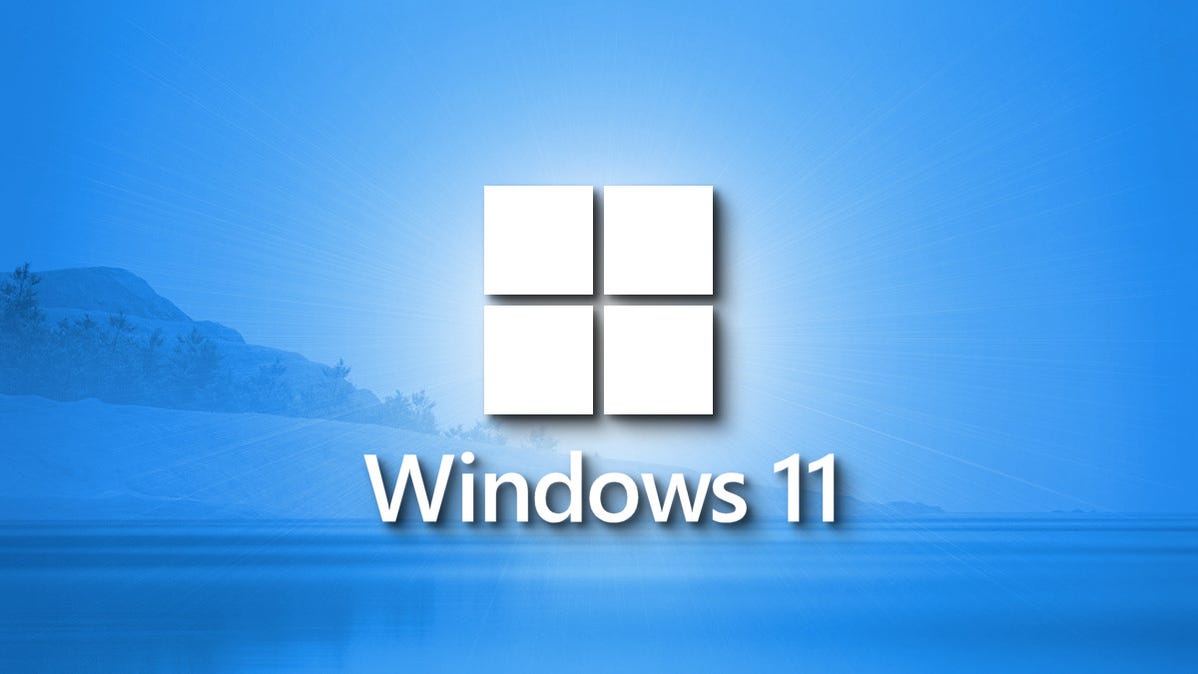 A fresh Windows 11 logo on a blue landscape