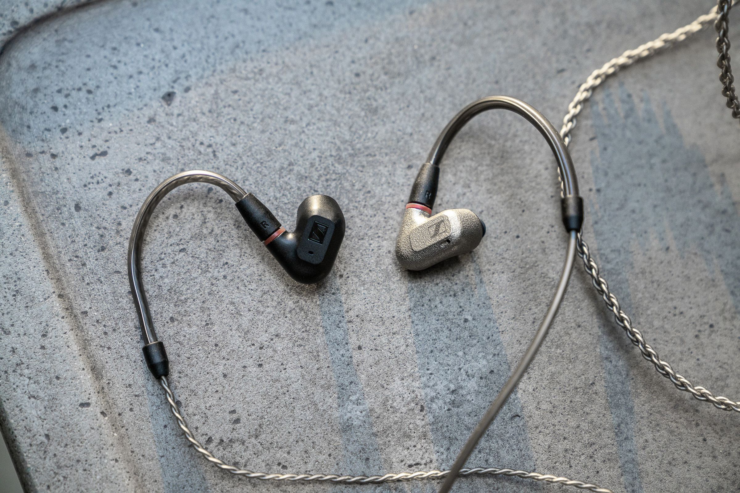 A photo of Sennheiser’s IE 200 earbuds next to the company’s IE 600 eabuds.
